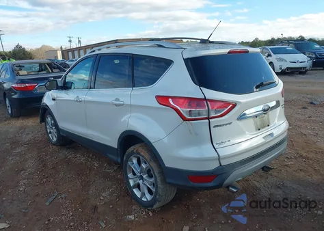 2014 Ford Escape Titanium z USA, uszkodzony, nr VIN 1FMCU9JX9EUB53327